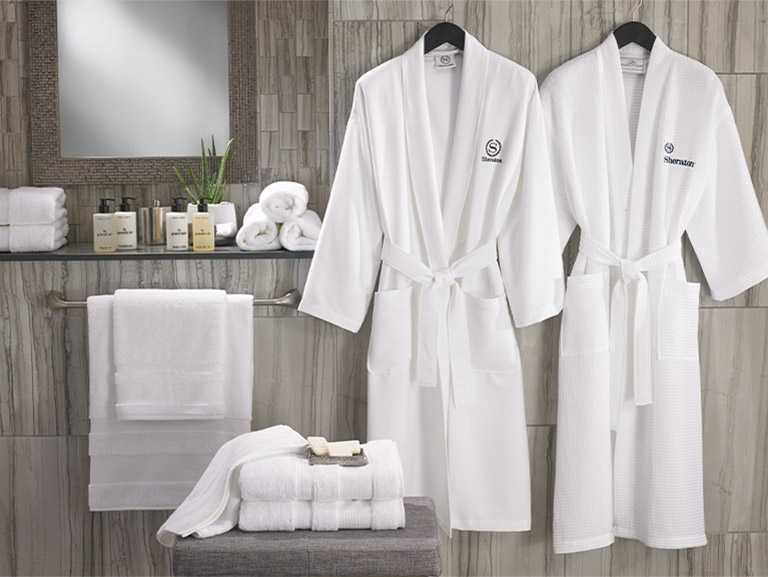 Set of robes towels and care set in a bathroom